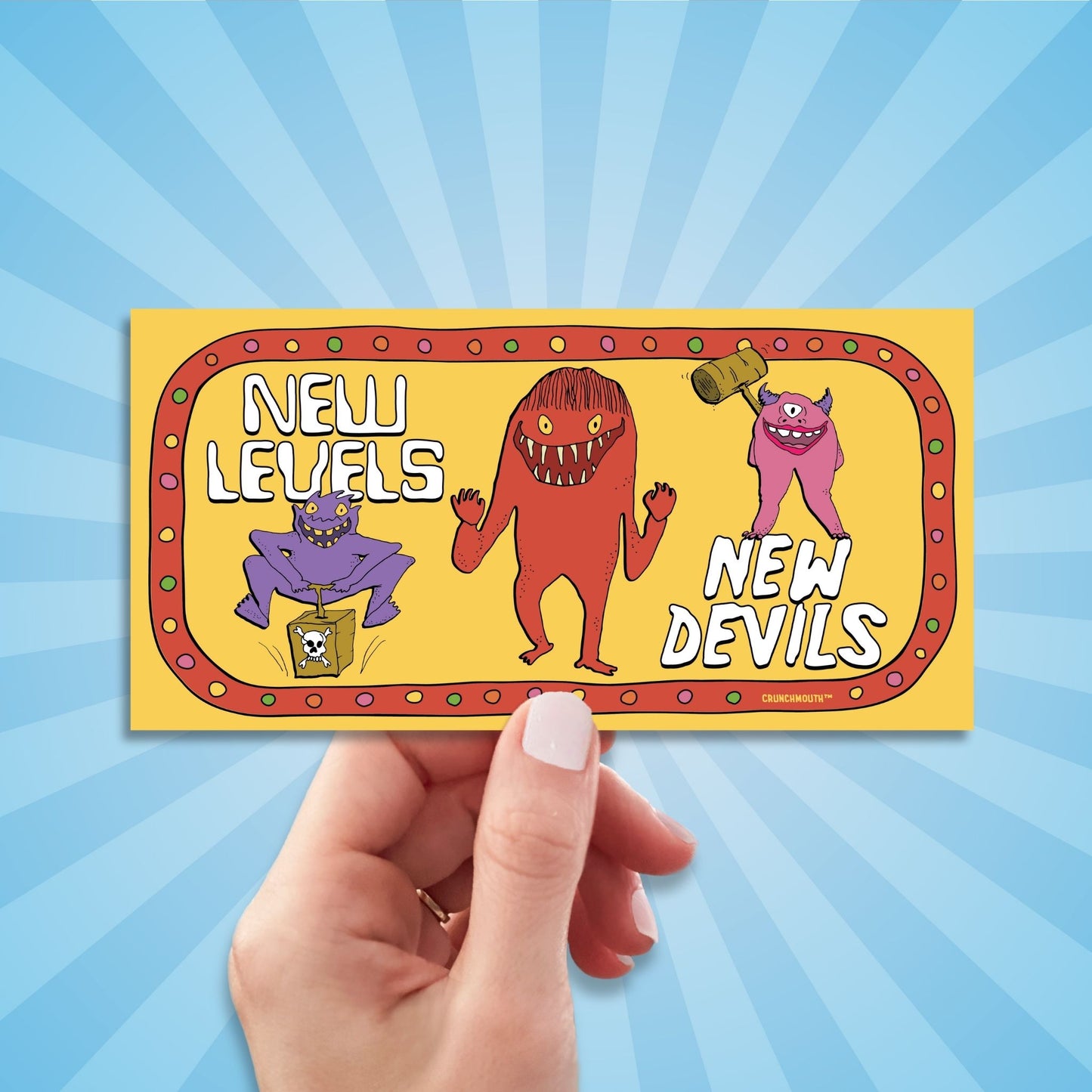 new levels new devils bumper sticker, hand display, sun rays design background
