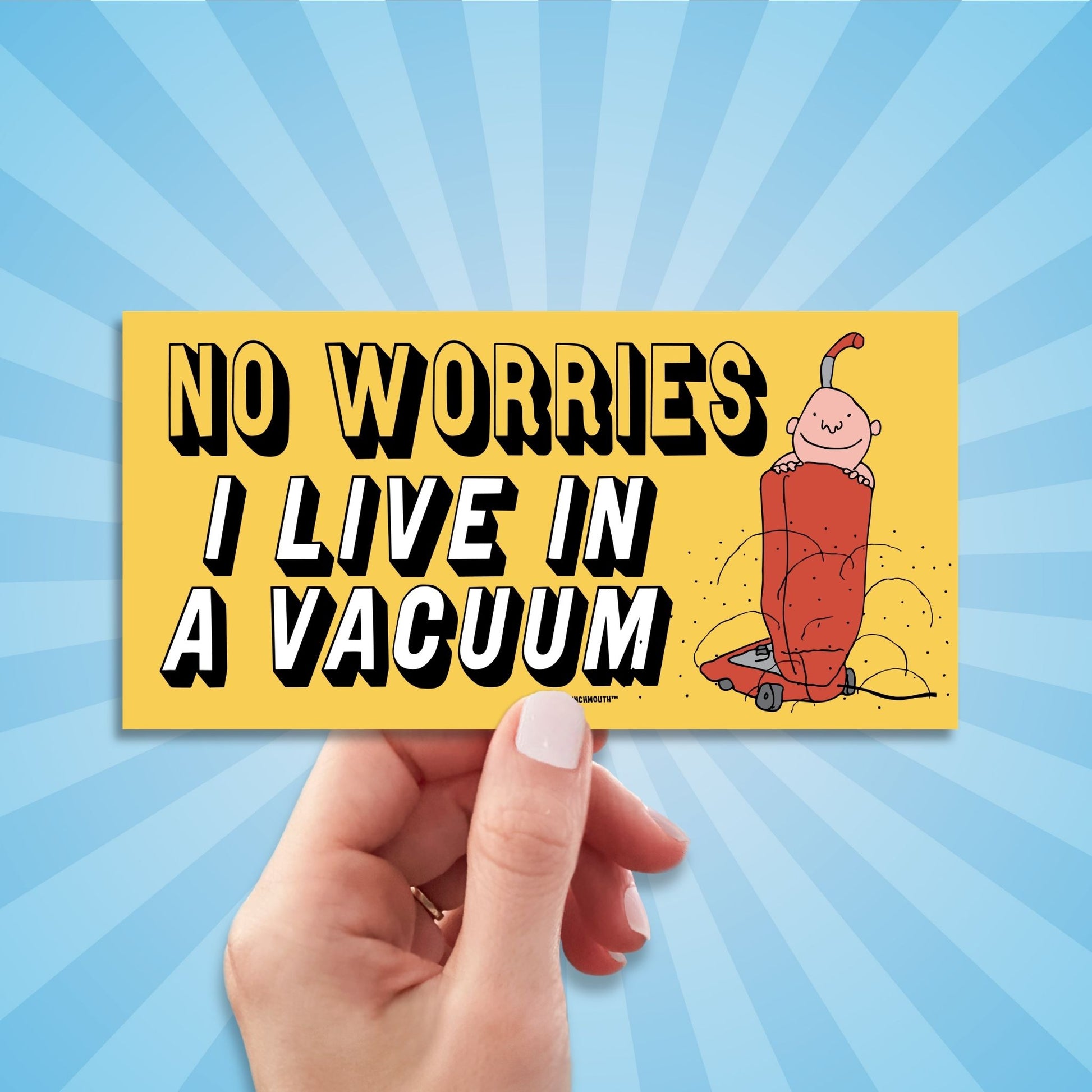 no worries i live in a vacuum bumper sticker, hand display, sun rays design background

