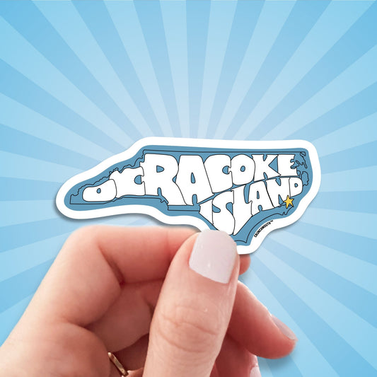 Ocracoke island travel luggage sticker, hand display, sun rays design background
