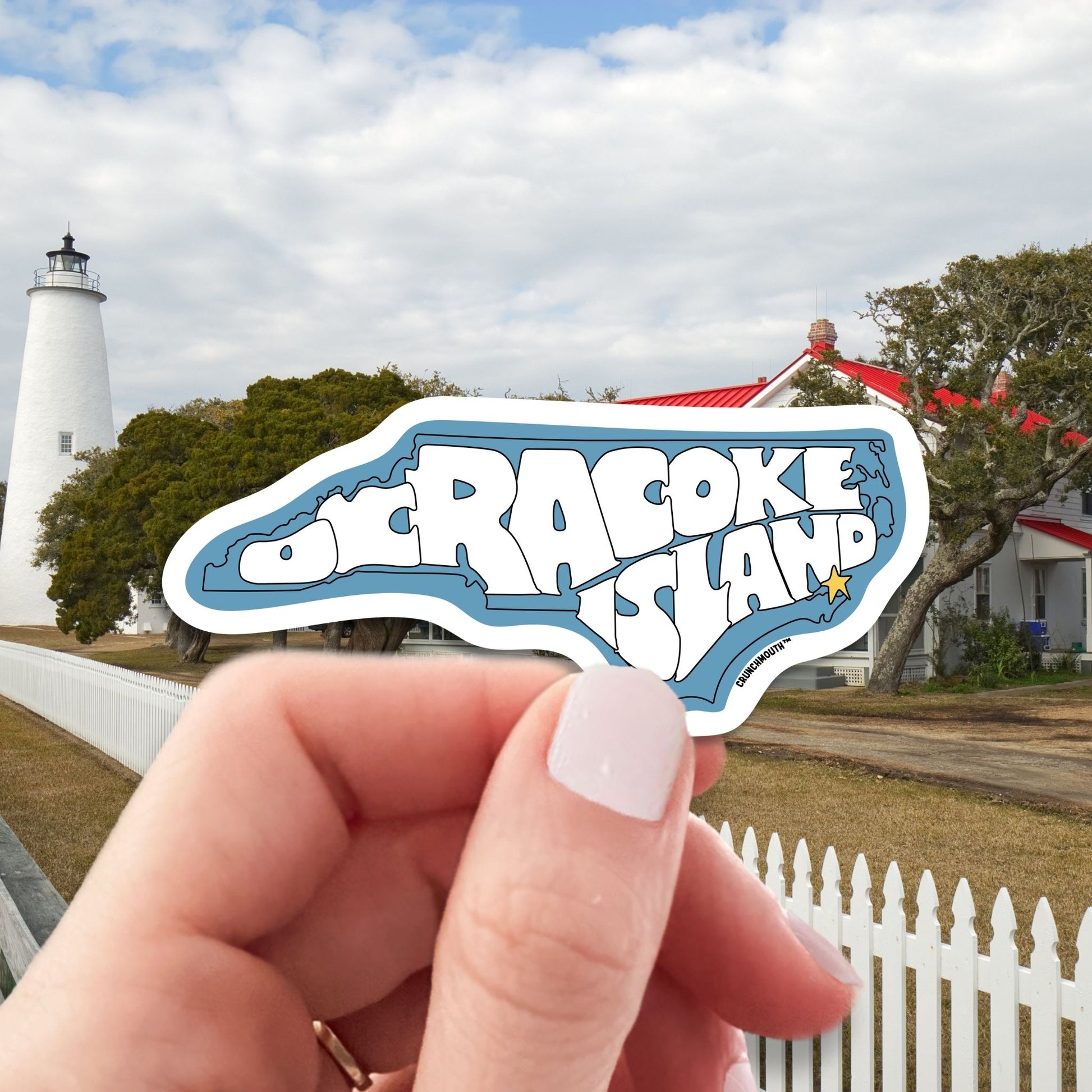 Ocracoke island travel luggage sticker, hand display, ocracoke island lighthouse background
