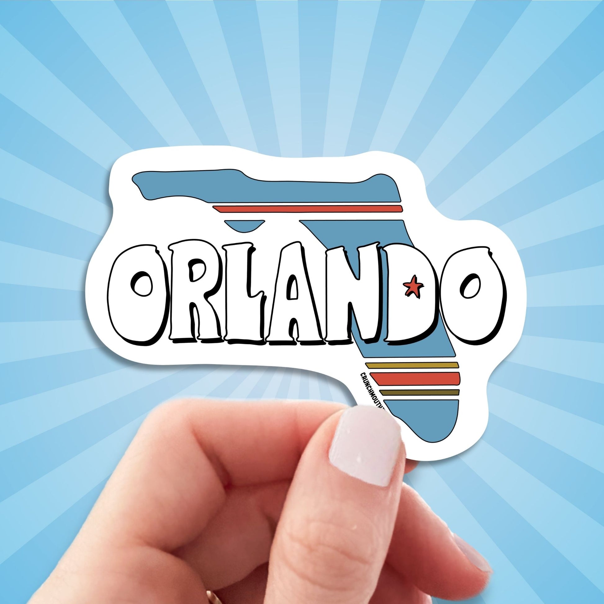 orlando travel luggage sticker, hand display, sun rays design background

