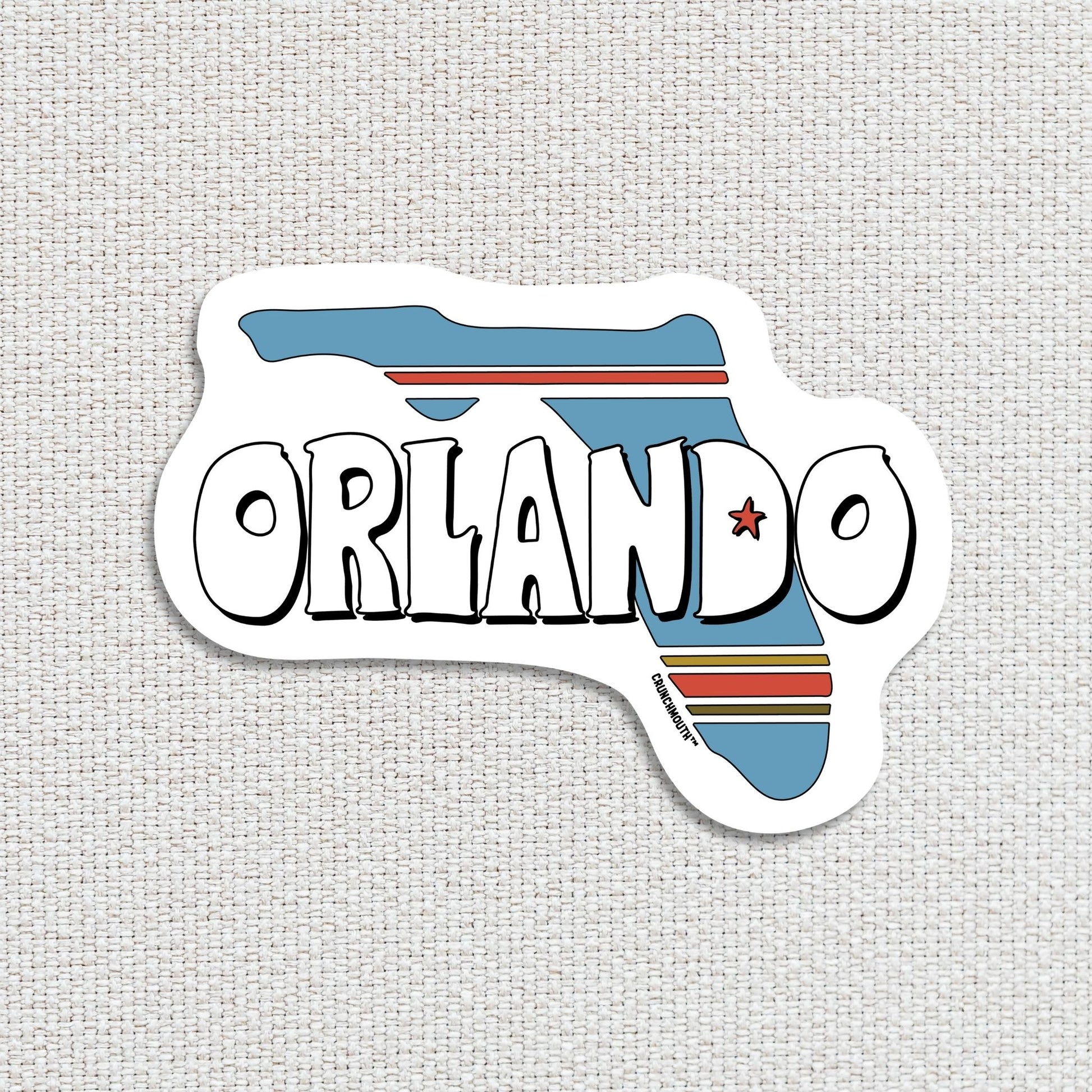 orlando travel luggage sticker, textured fabric background
