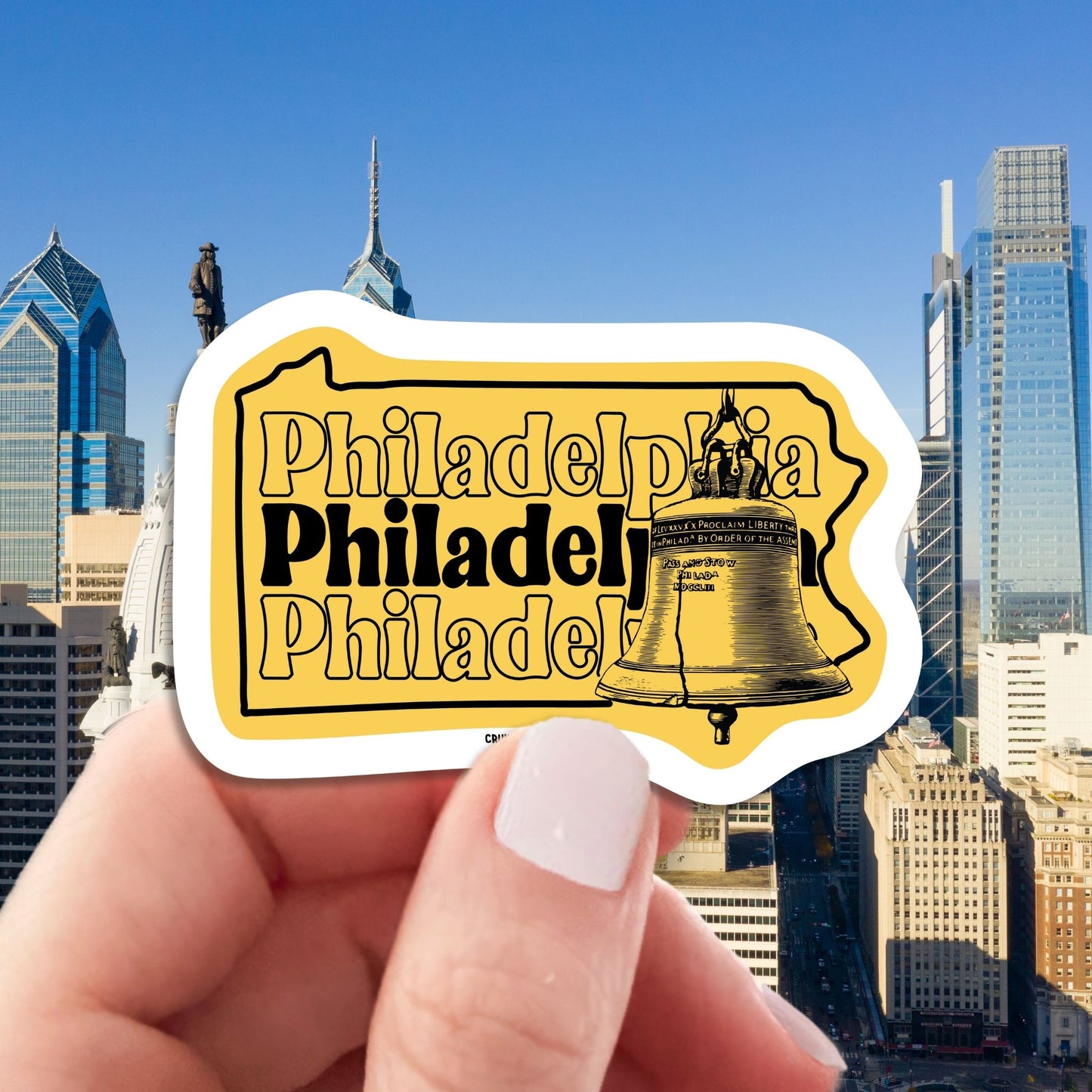 philadelphia travel luggage sticker, hand display, city skyline background