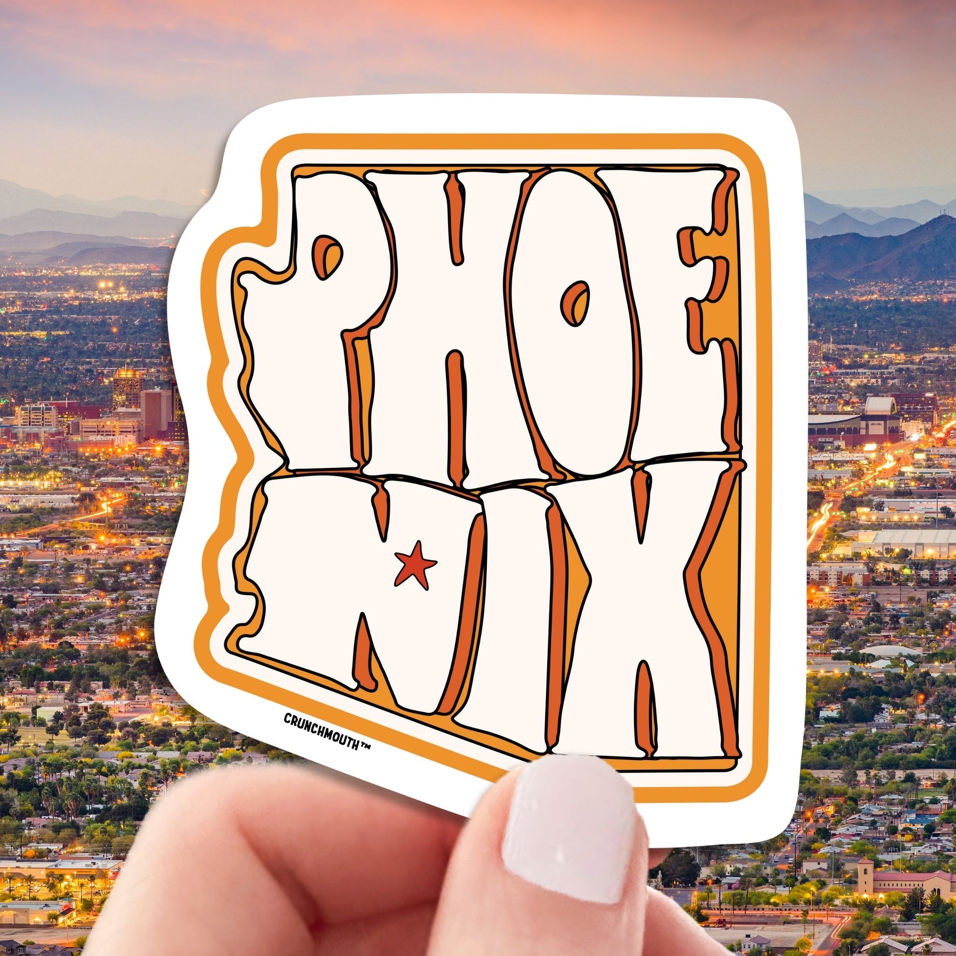 phoenix travel luggage sticker, hand display, cityscape background