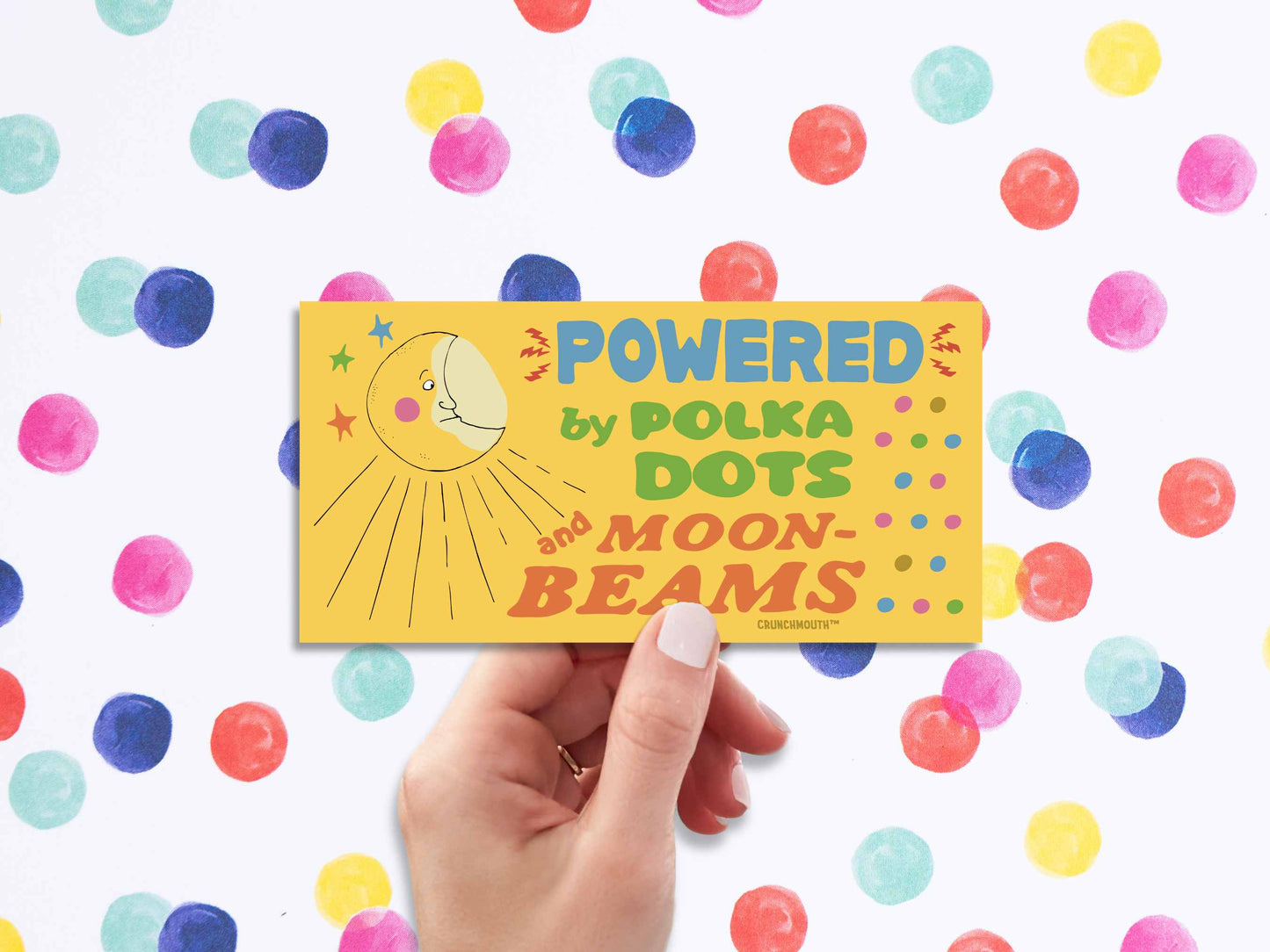 powered by polka dots and moonbeams bumper sticker, hand display, colorful polka dots background