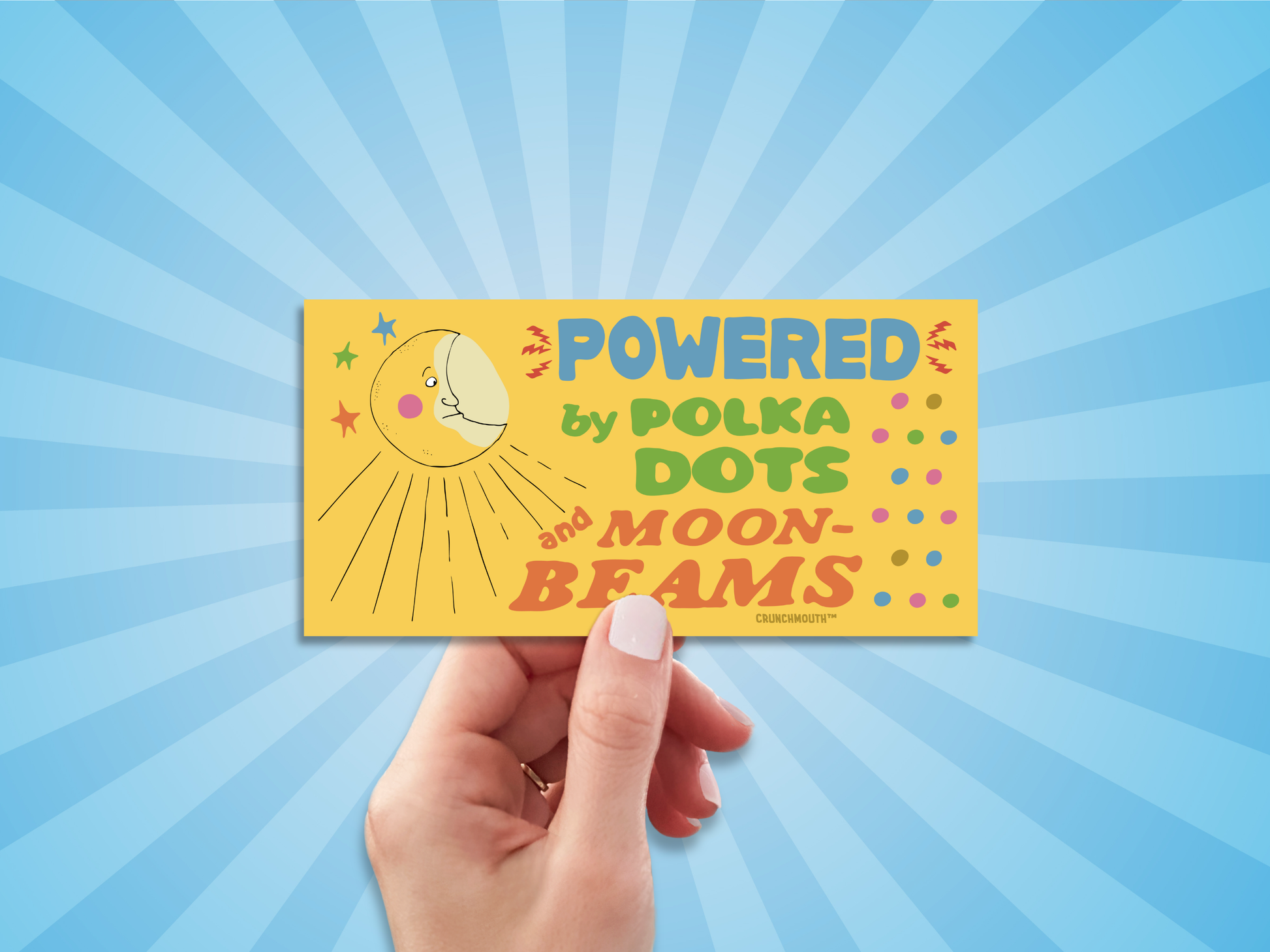 powered by polka dots and moonbeams bumper sticker, hand display, sun rays design background