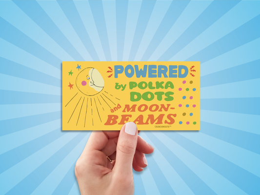 powered by polka dots and moonbeams bumper sticker, hand display, sun rays design background