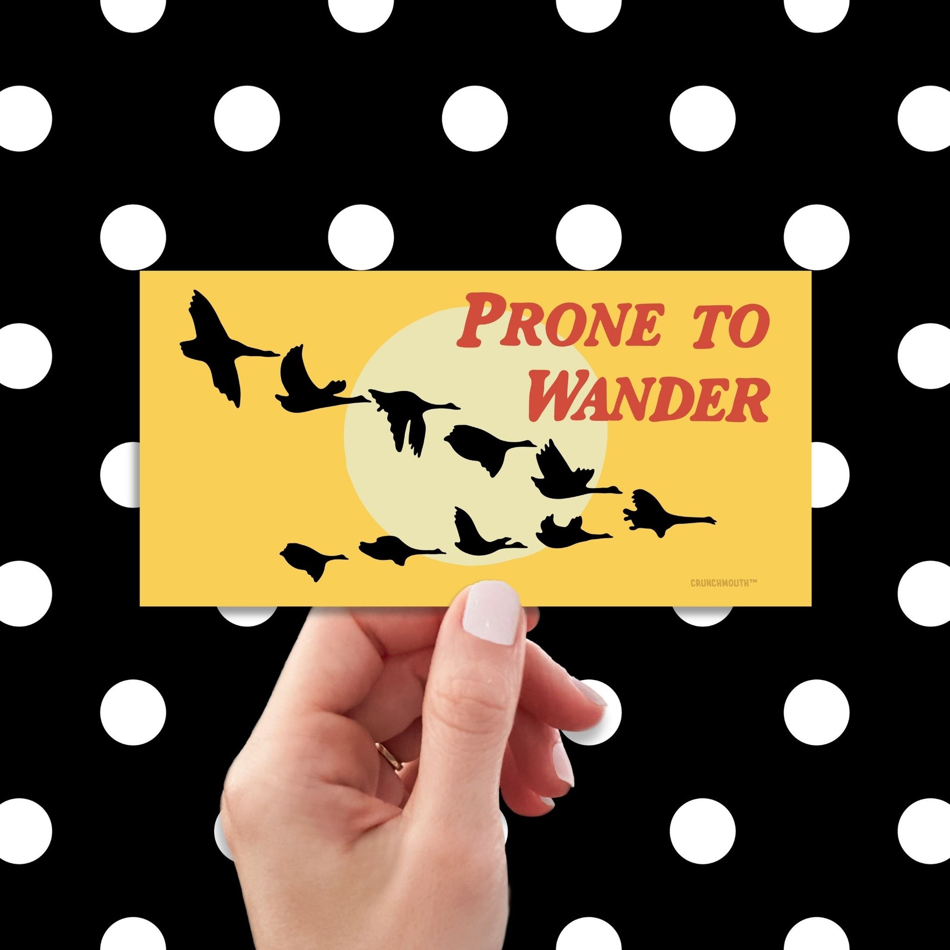 prone to wander Canada geese bumper sticker, hand display, polka dots pattern design background
