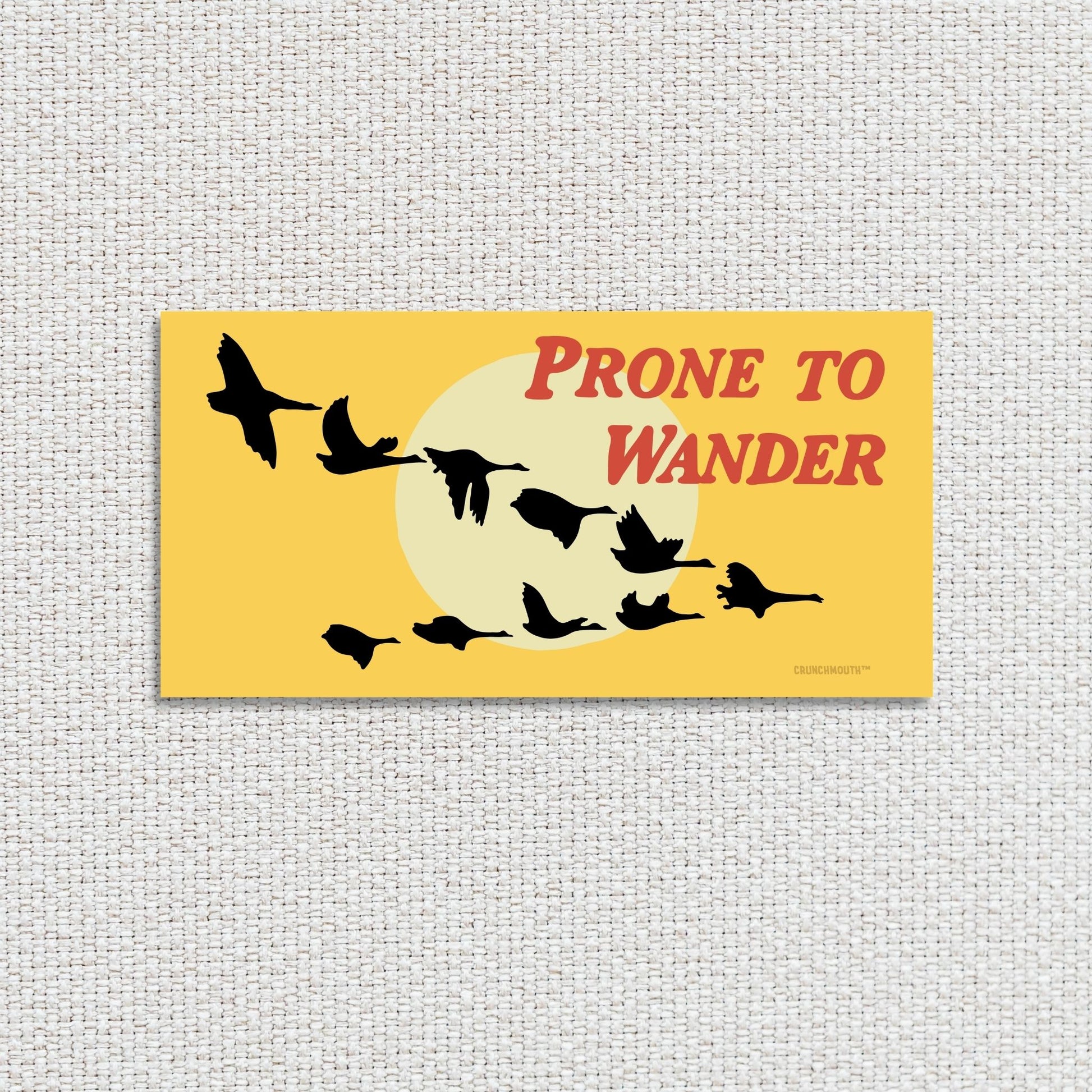 prone to wander Canada geese bumper sticker, textured fabric background
