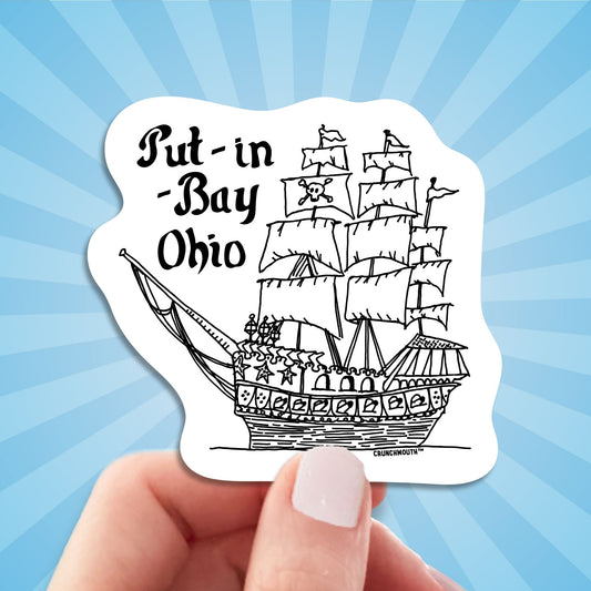 put-in-bay pirate ship travel luggage sticker, hand display, sun rays design background