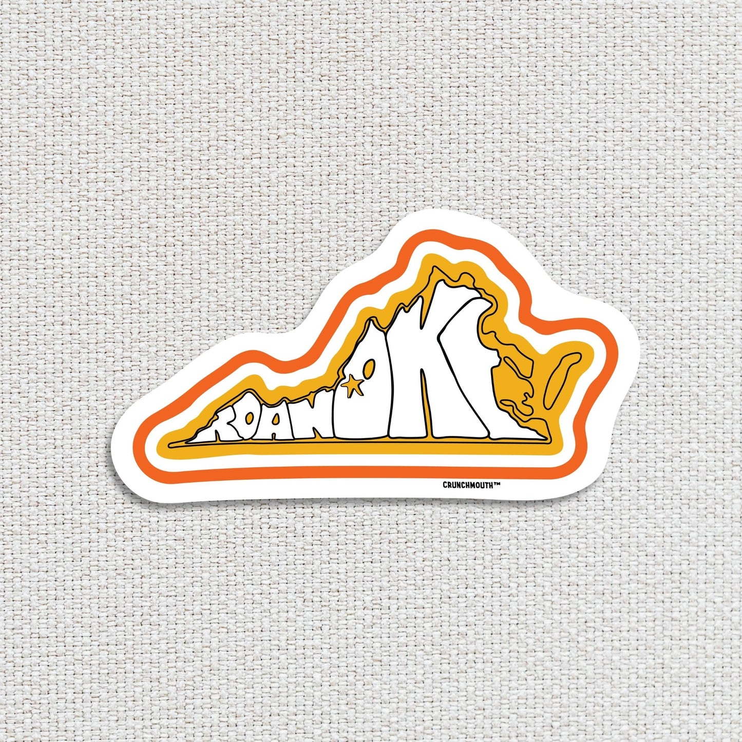 roanoke travel luggage sticker, textured fabric background
