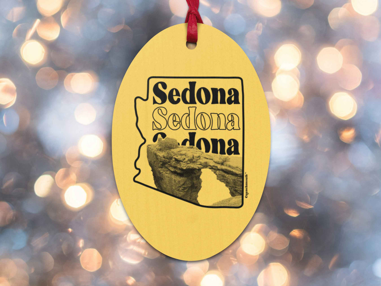 sedona Christmas ornament, back, Christmas lights background