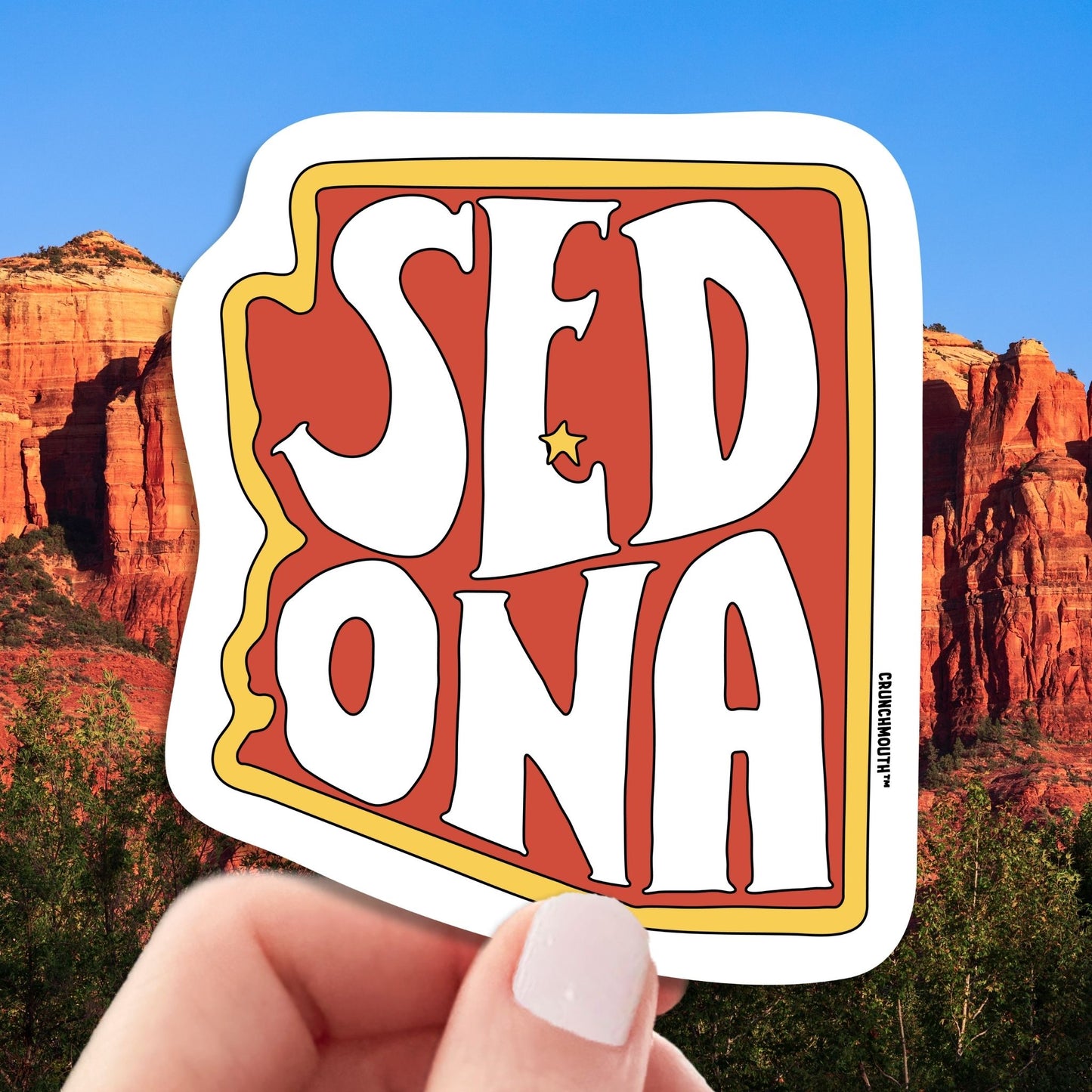 sedona travel luggage sticker, hand display, cathedral rock background