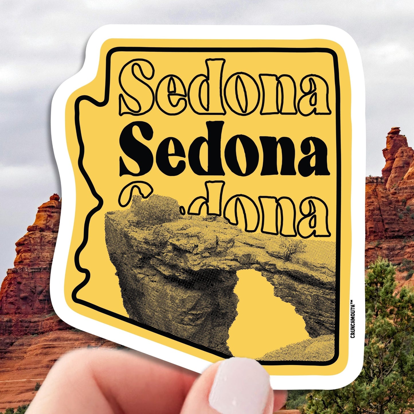 sedona arizona laptop sticker, hand display, red rocks background