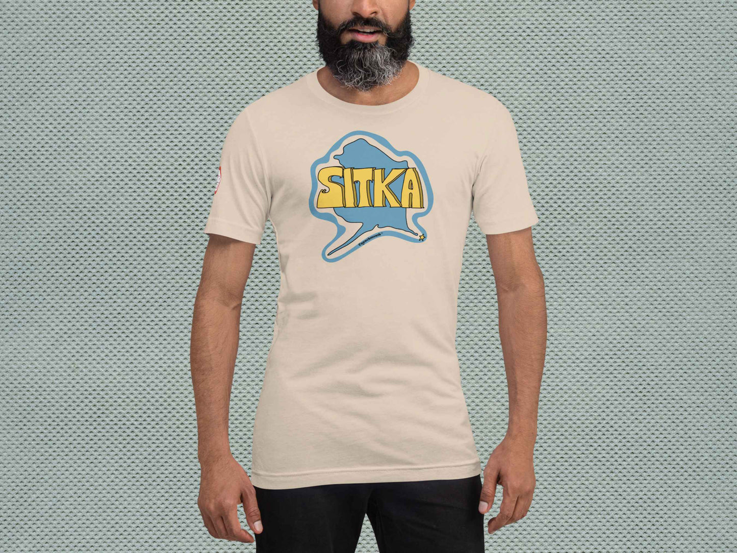 sitka shirt, souvenir t shirts, male model, front, silver textured background