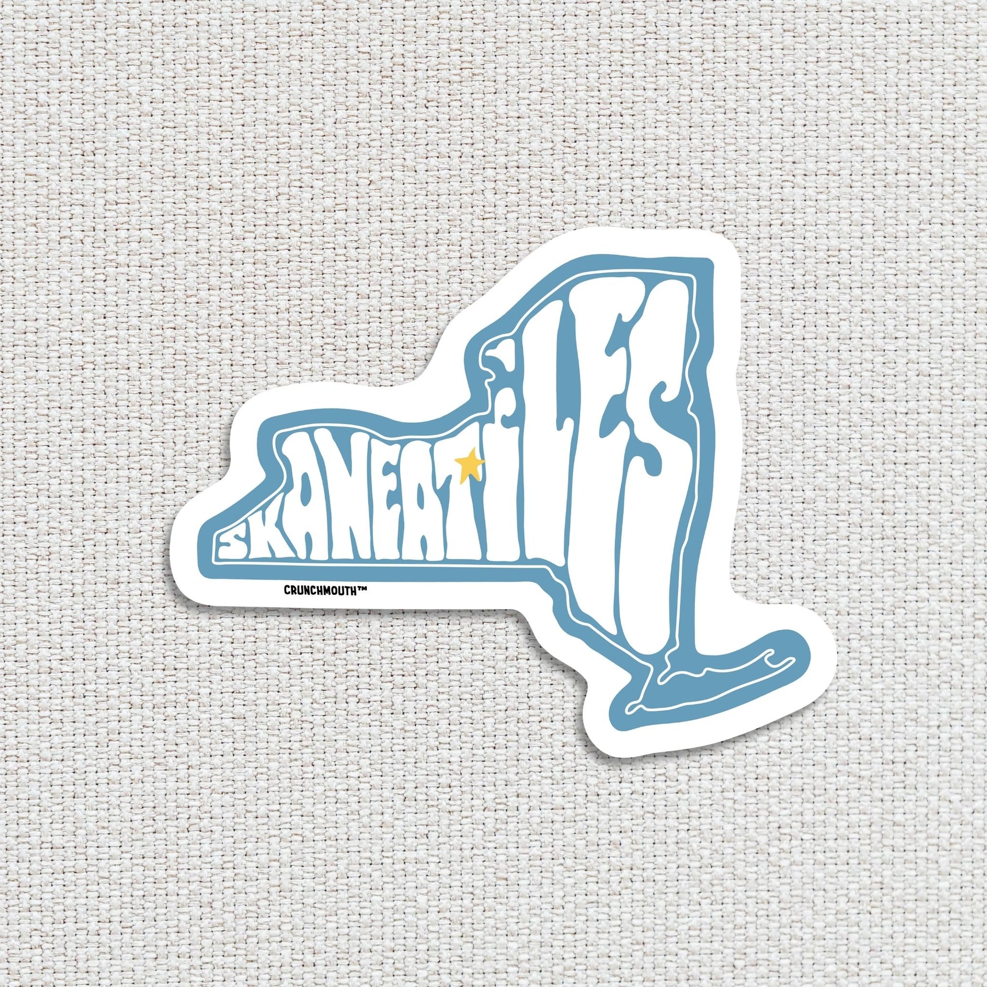 skaneateles new york travel luggage sticker, white textured fabric background