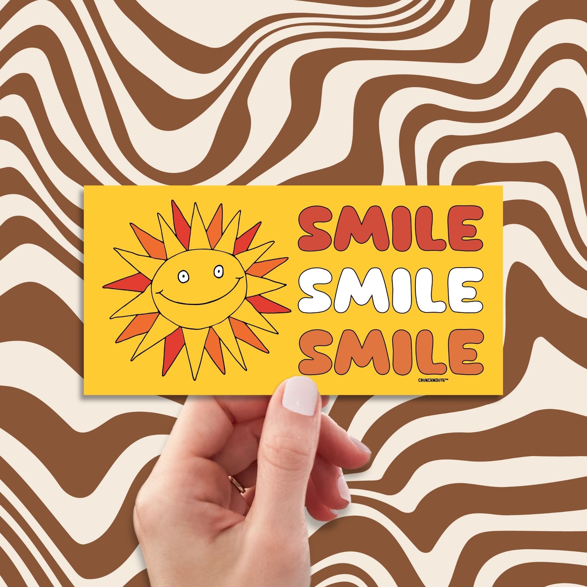 smile smile smile bumper sticker, very bad intentions, hand display, retro design background
