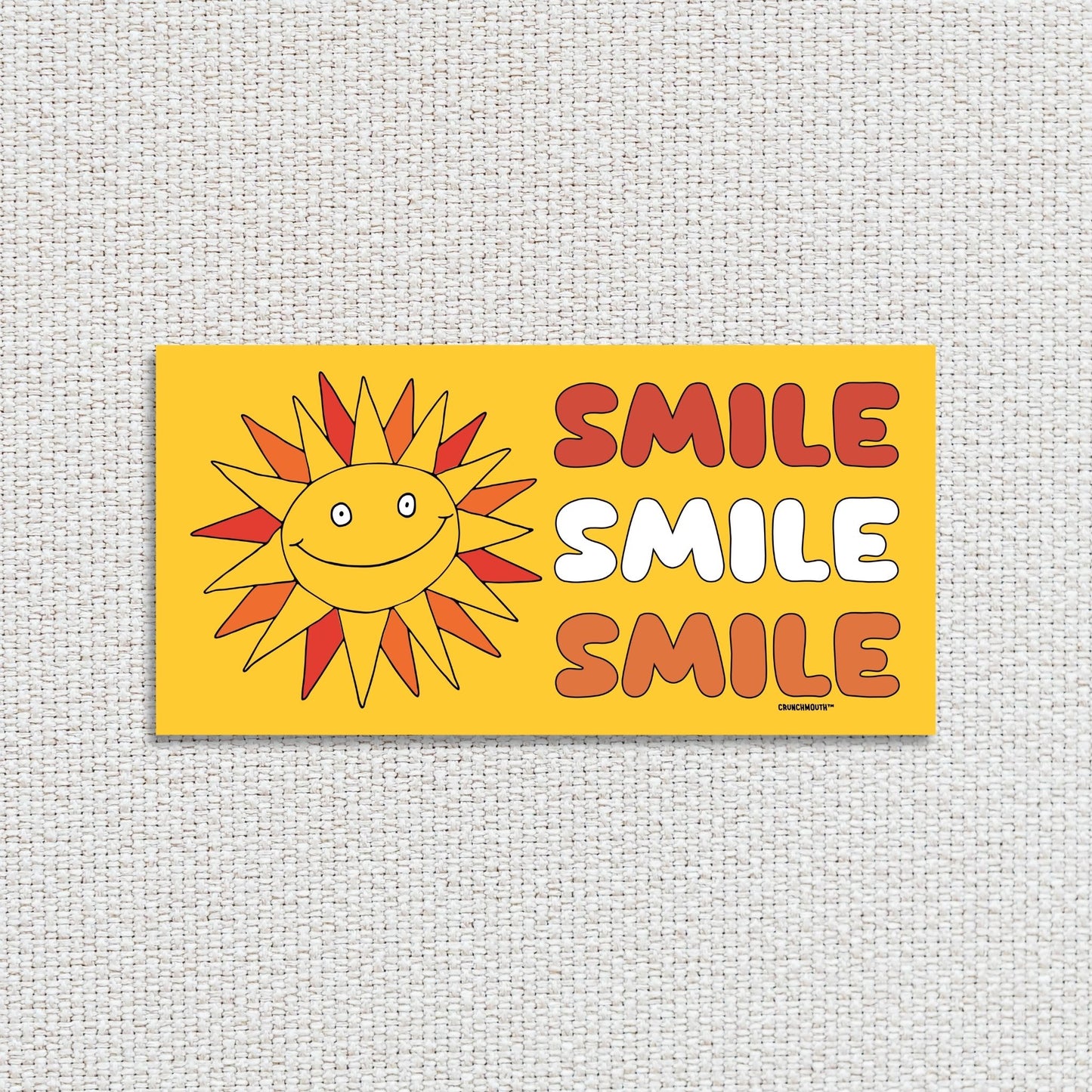 smile smile smile bumper sticker, very bad intentions, textured fabric background
