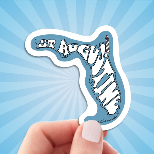 st augustine travel luggage sticker, hand display, sun rays design background