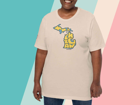 state of michigan shirt, front, female model, pastel stripe background