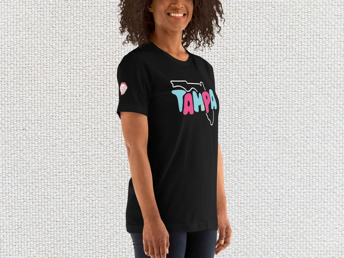 tampa souvenir t-shirt, female model, front right, white textured background