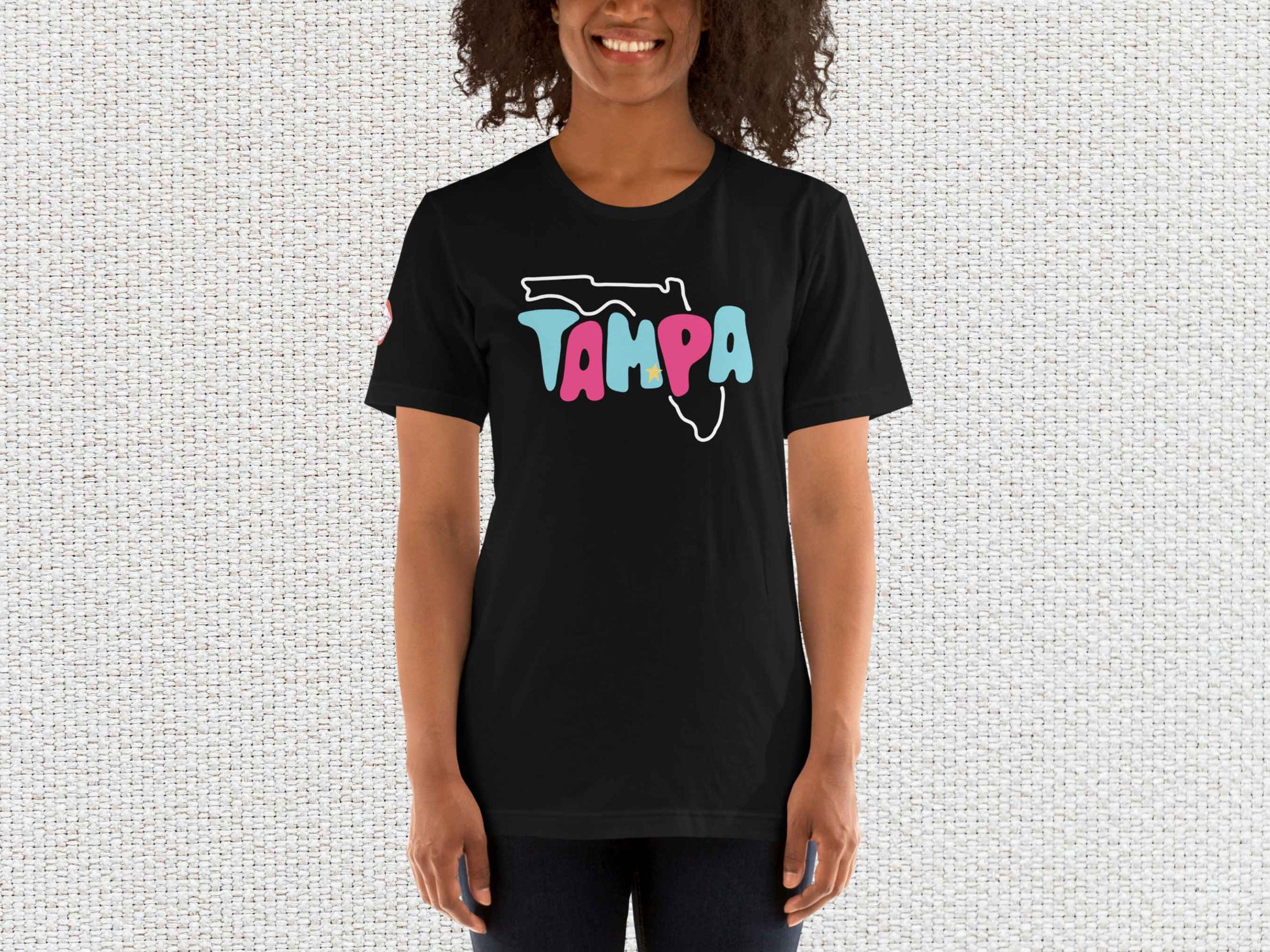 tampa souvenir t-shirt, female model, front, white textured background