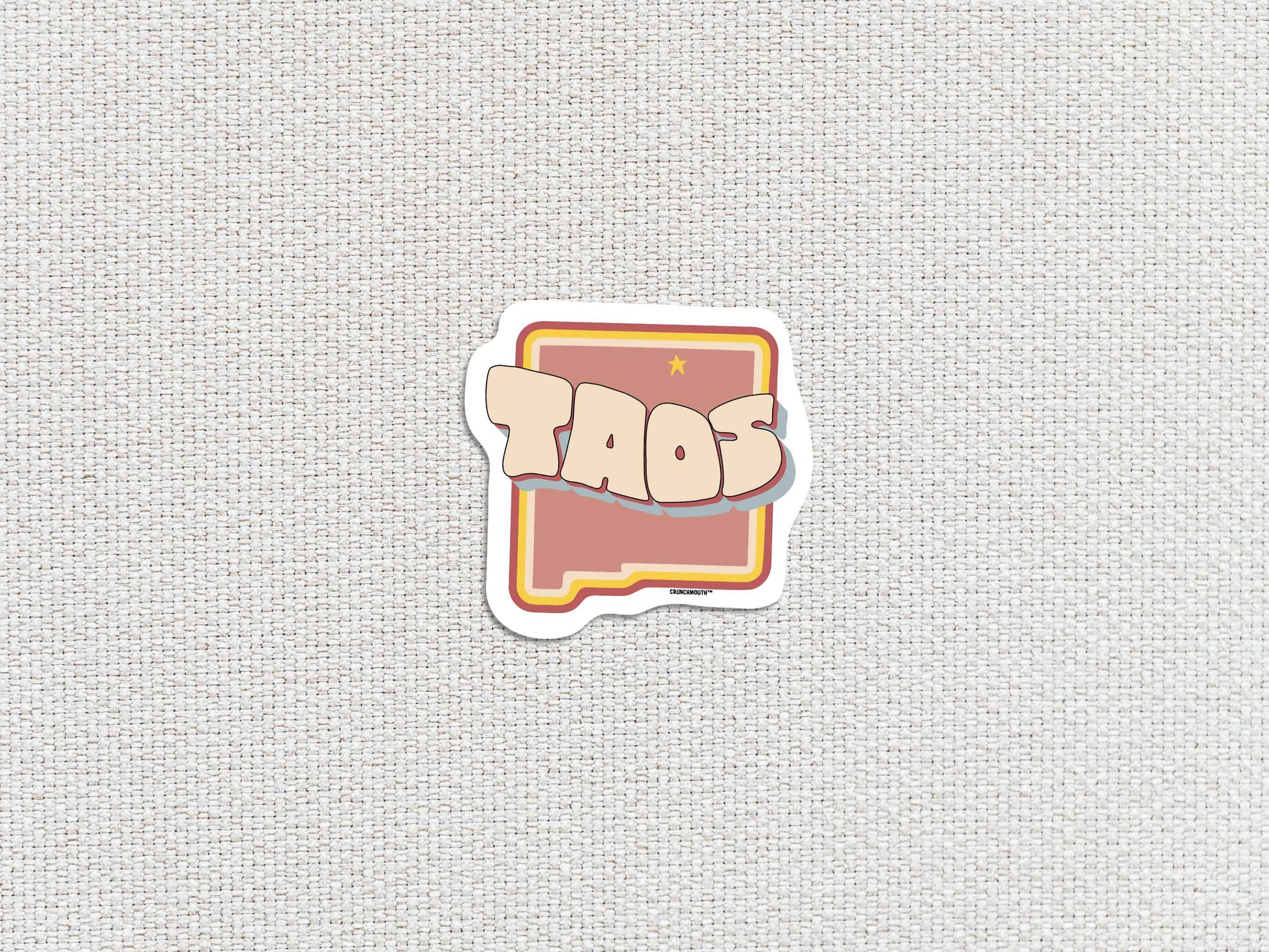 taos travel luggage sticker, white textured background