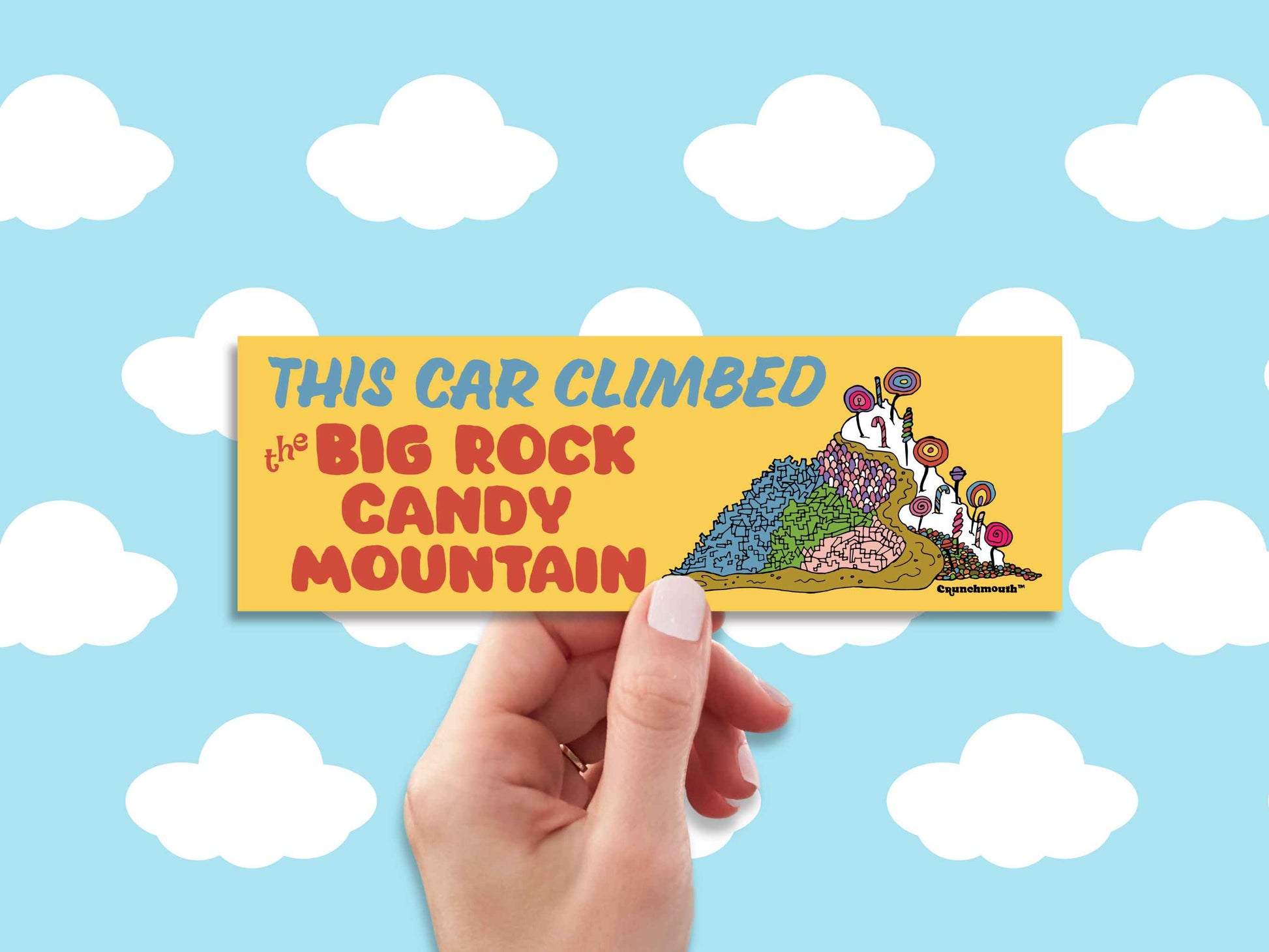 this car climbed the big rock candy mountain bumper sticker, hand display, clouds background