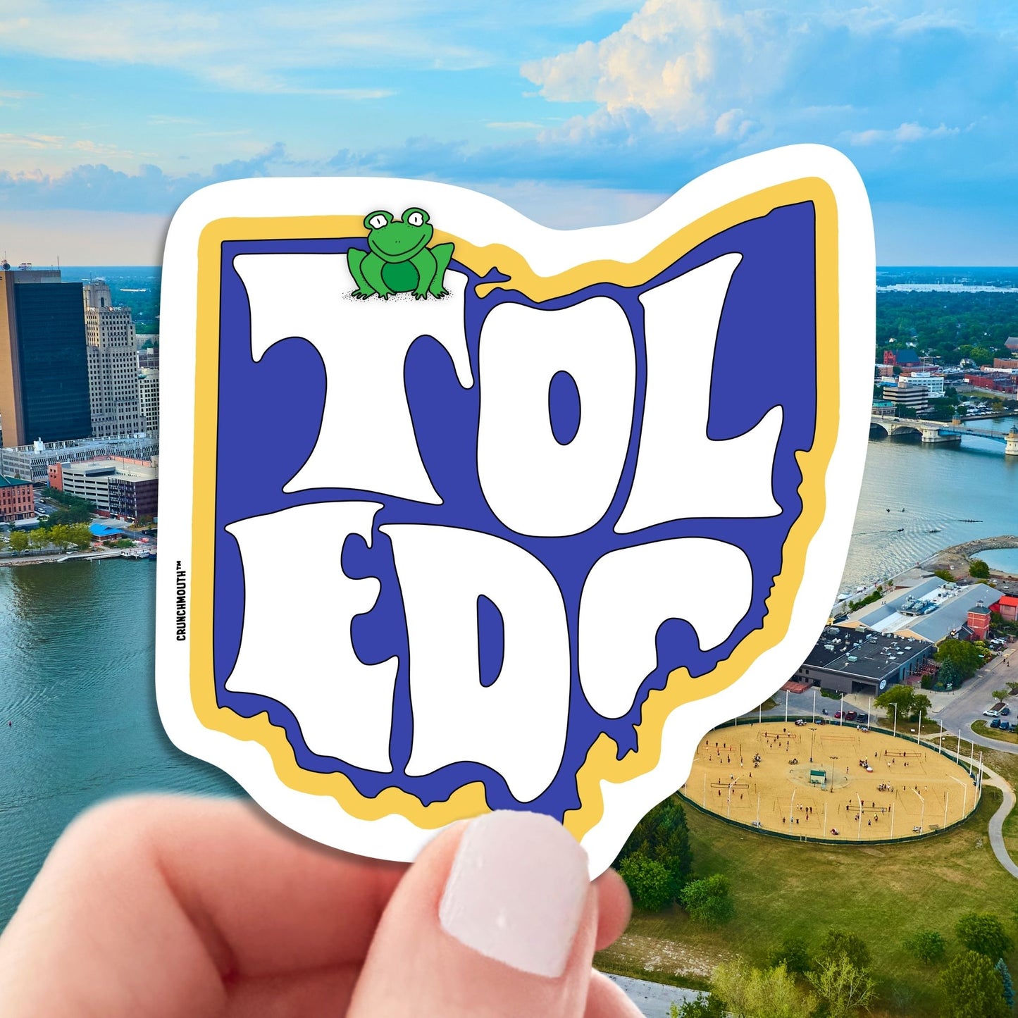 toledo travel luggage sticker, hand display, Toledo skyline background
