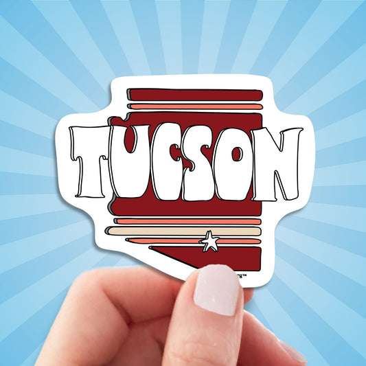 tucson travel luggage sticker, hand display, sun rays design background