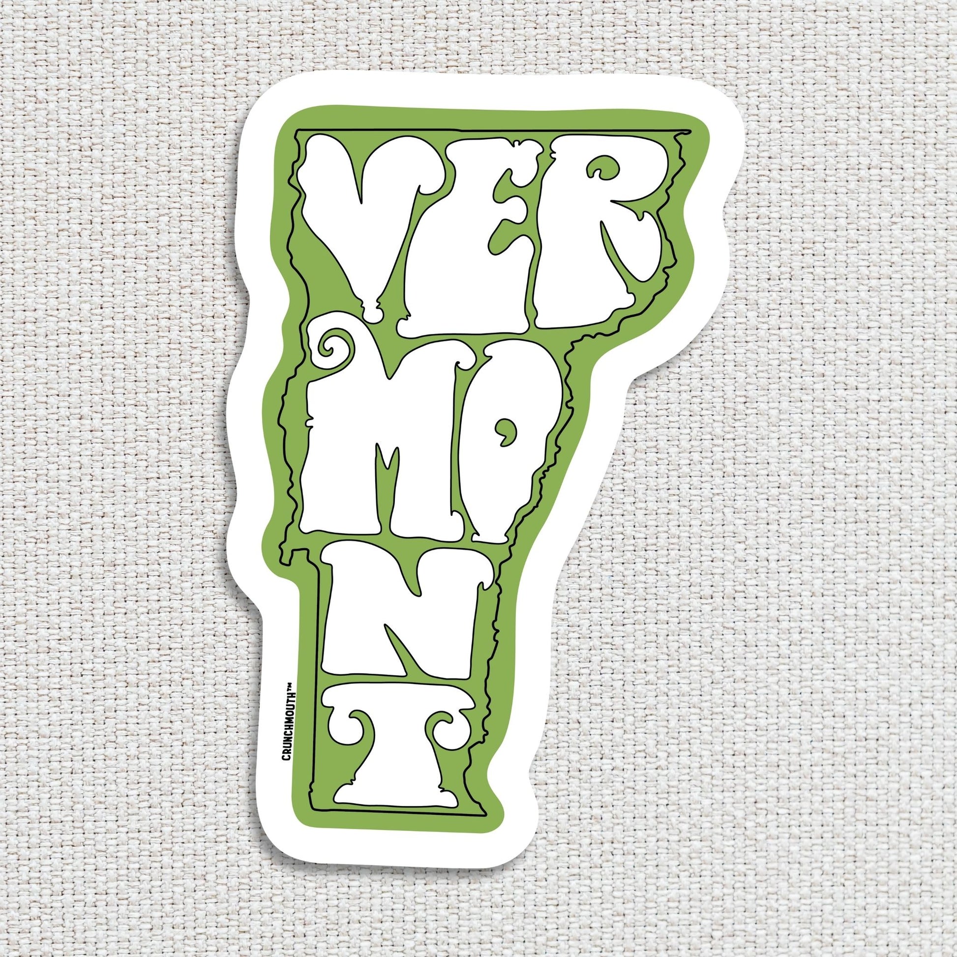 state of vermont travel luggage sticker, textured fabric background