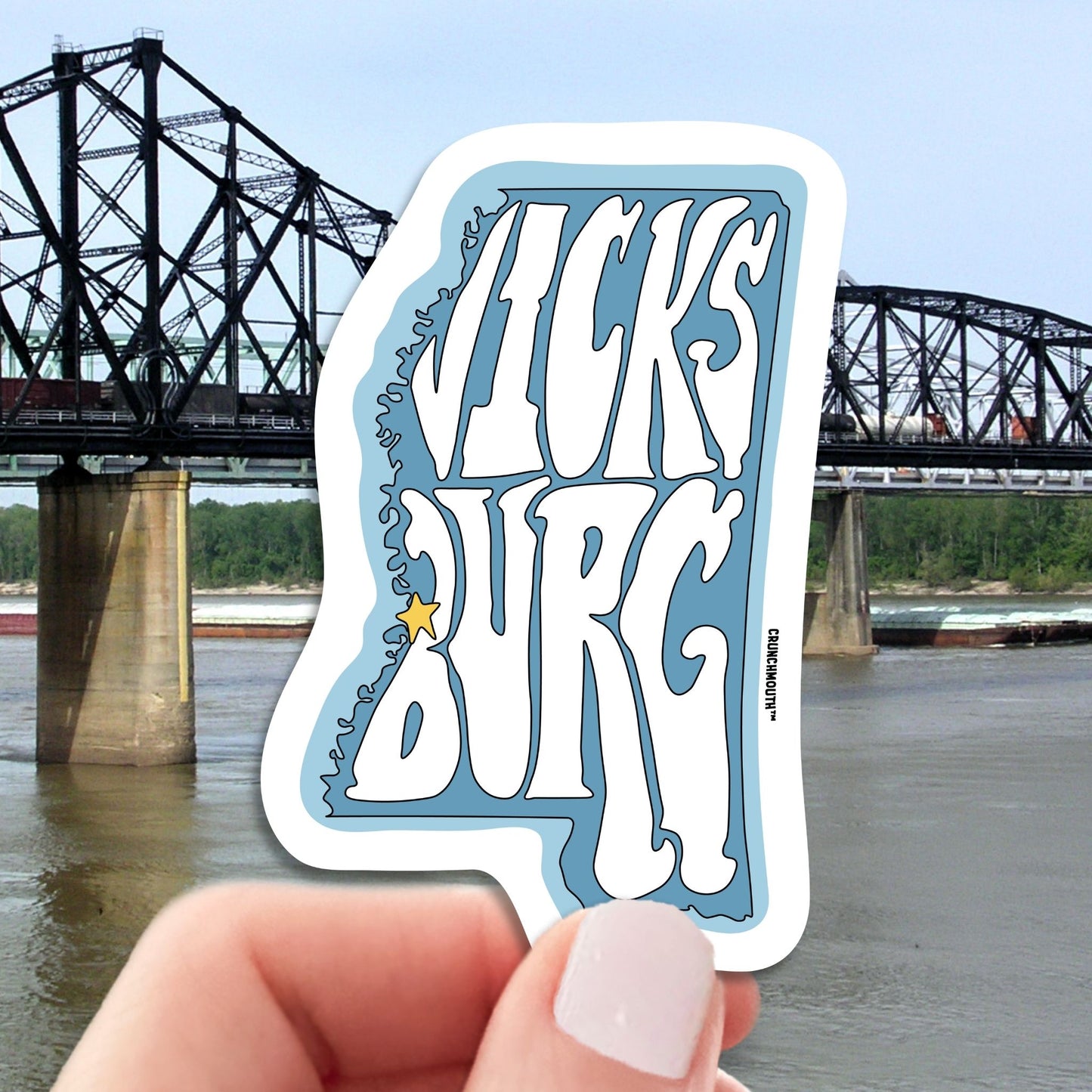 vicksburg travel luggage sticker, hand display, Mississippi river background
-