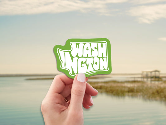 washington state travel luggage sticker, hand display, water background