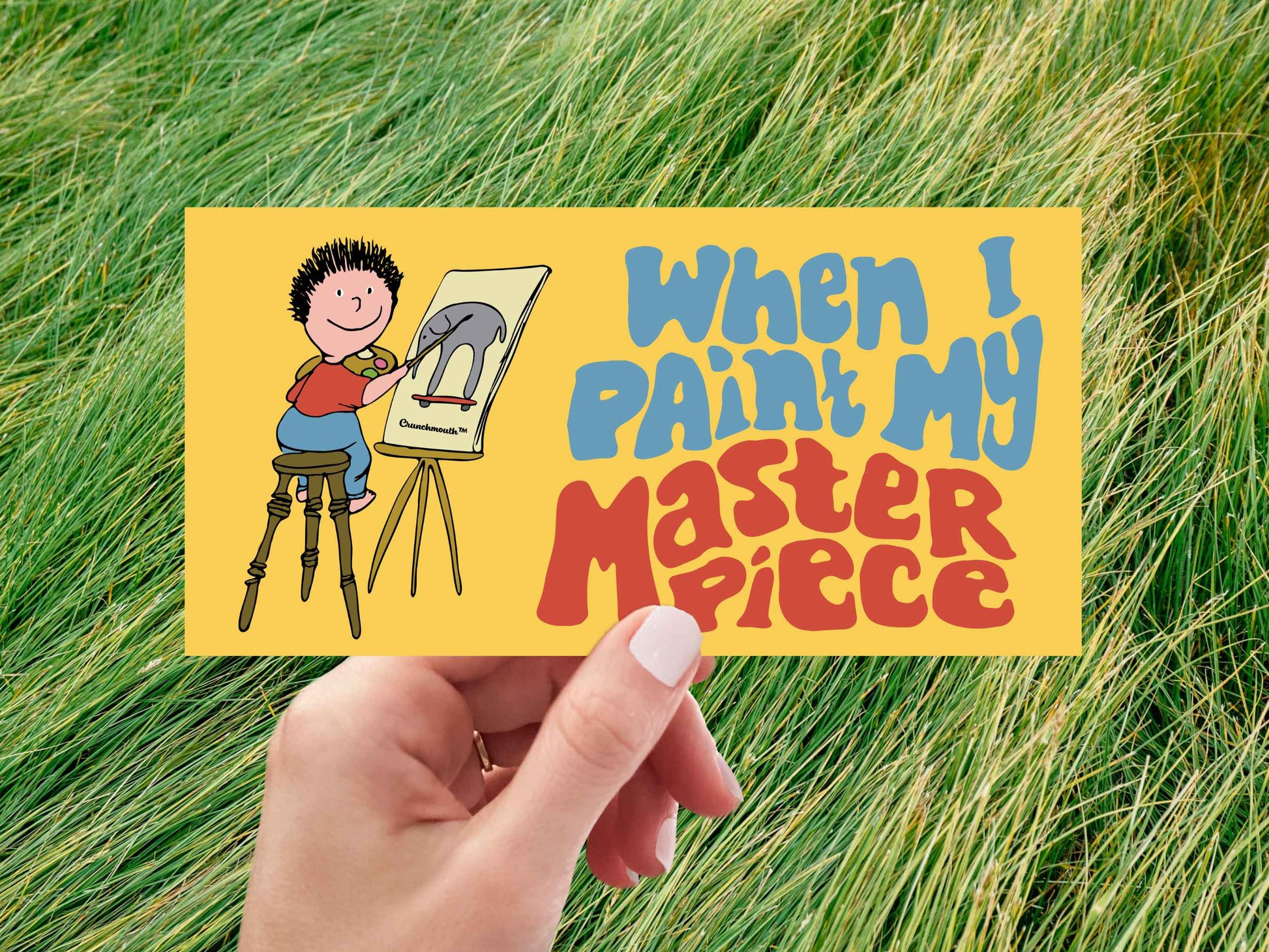 someday everything&#39;s gonna be different when i paint my masterpiece bumper sticker, hand display, green grass background