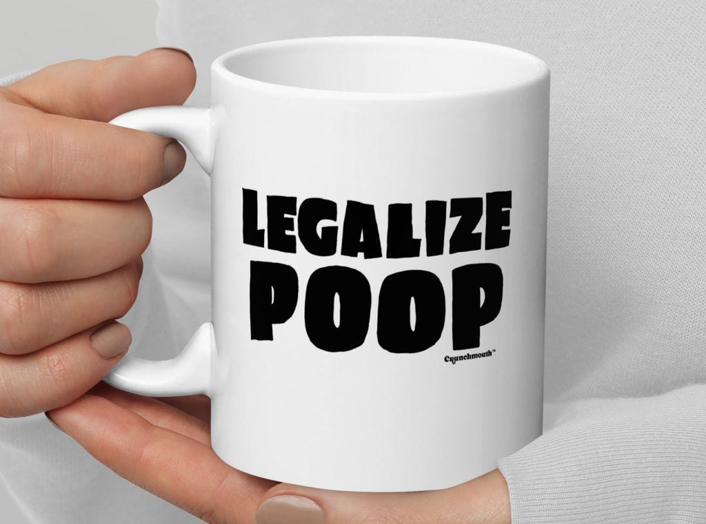 legalize poop 11oz ceramic mug, handle on left, held in hands display