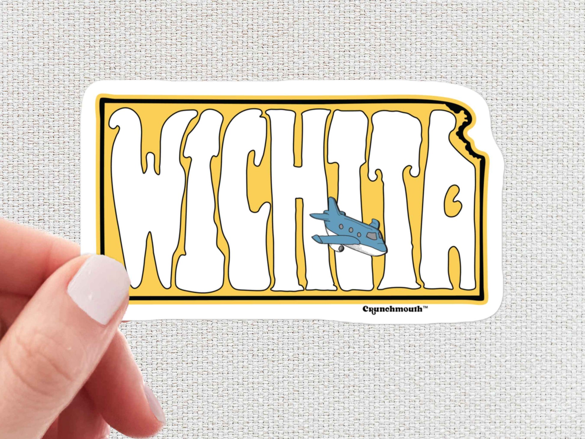 wichita travel luggage sticker, air capital of the world, hand display, white textured background