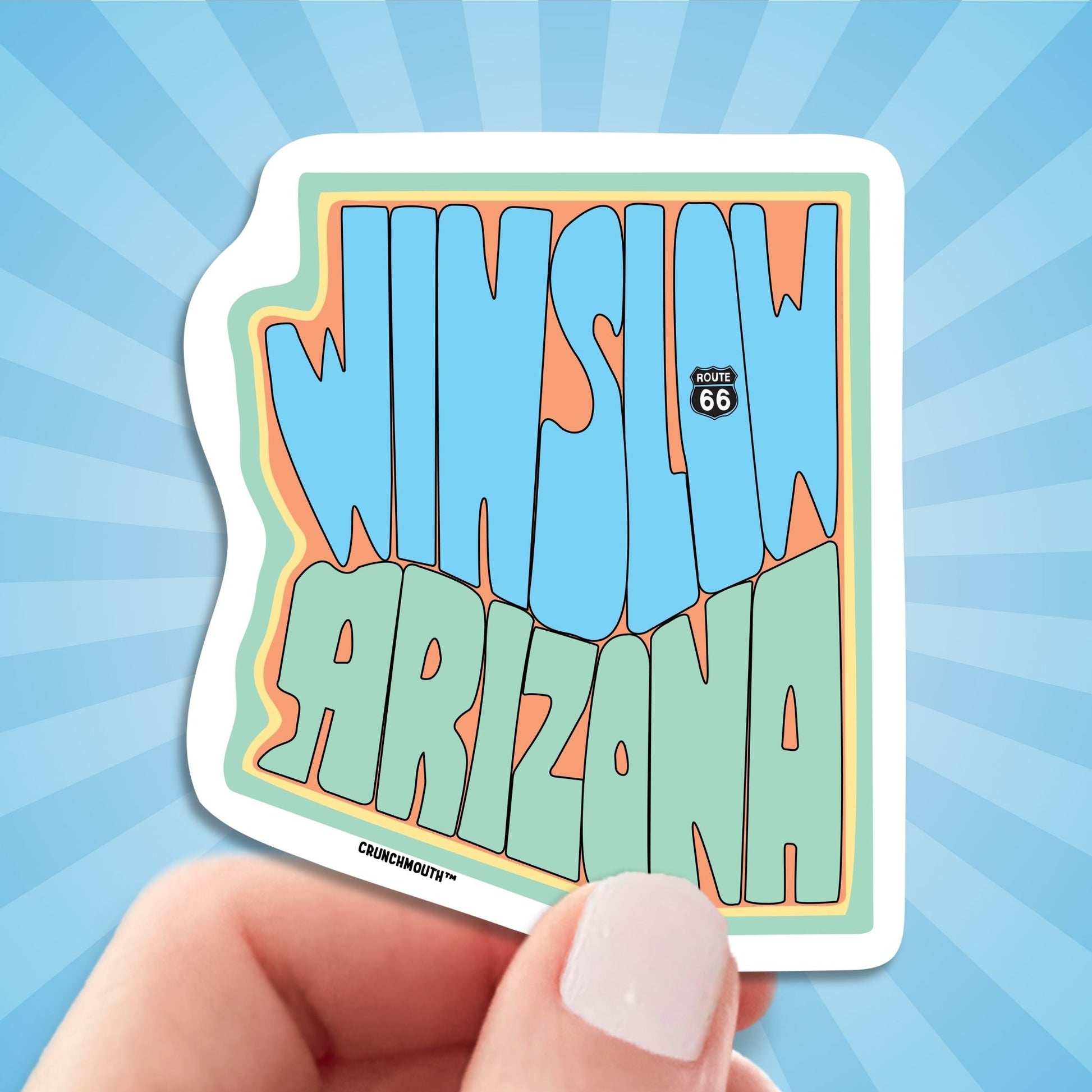 winslow Arizona travel luggage sticker, hand display, sun rays design background
