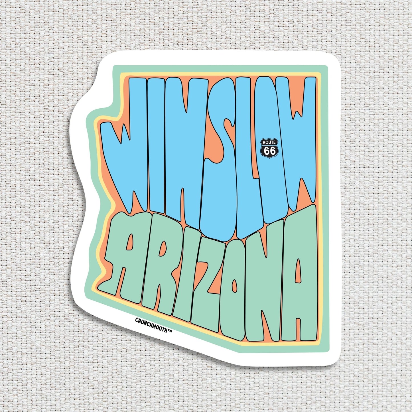 winslow Arizona travel luggage sticker, textured fabric background
