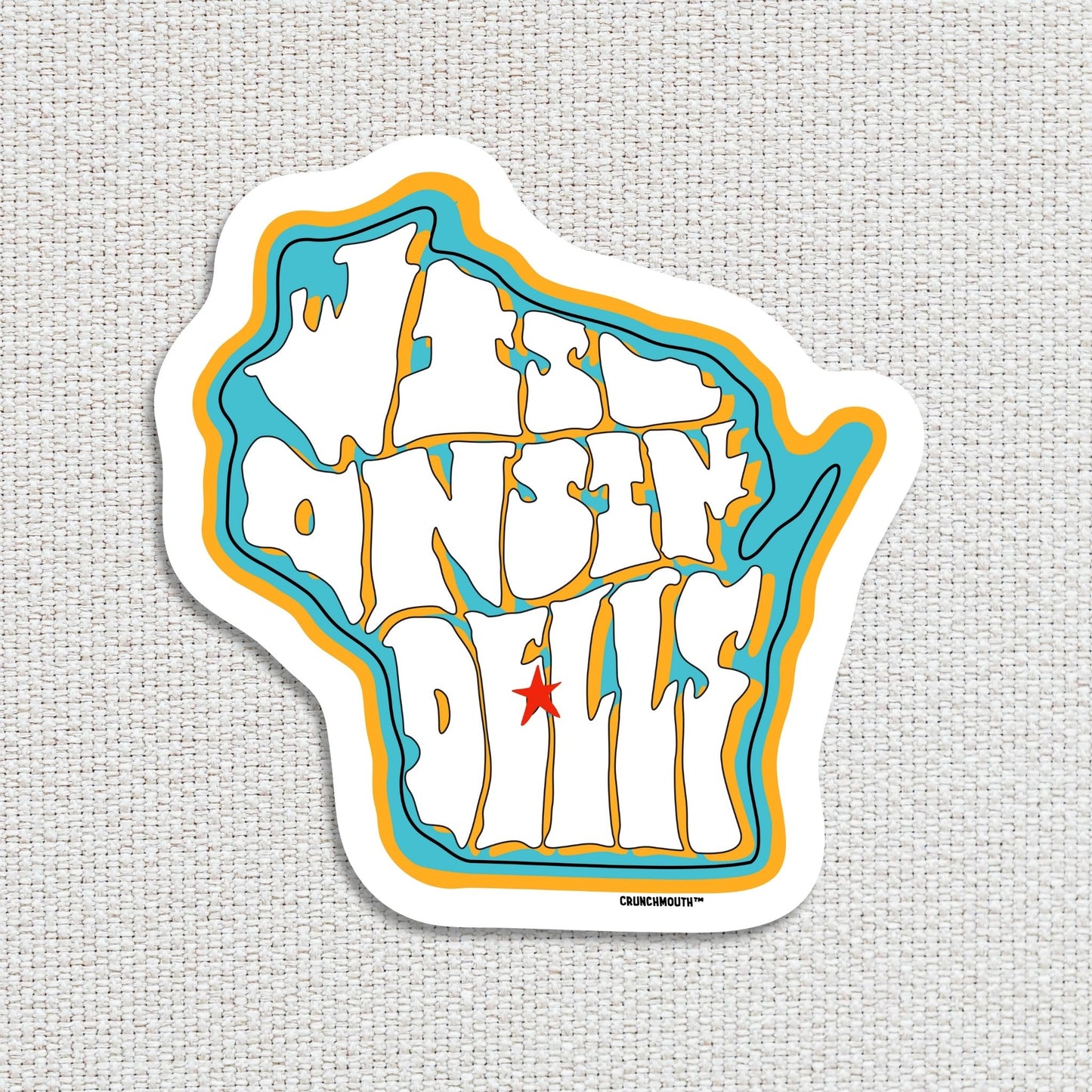 Wisconsin dells travel luggage sticker, hand display, textured fabric background
