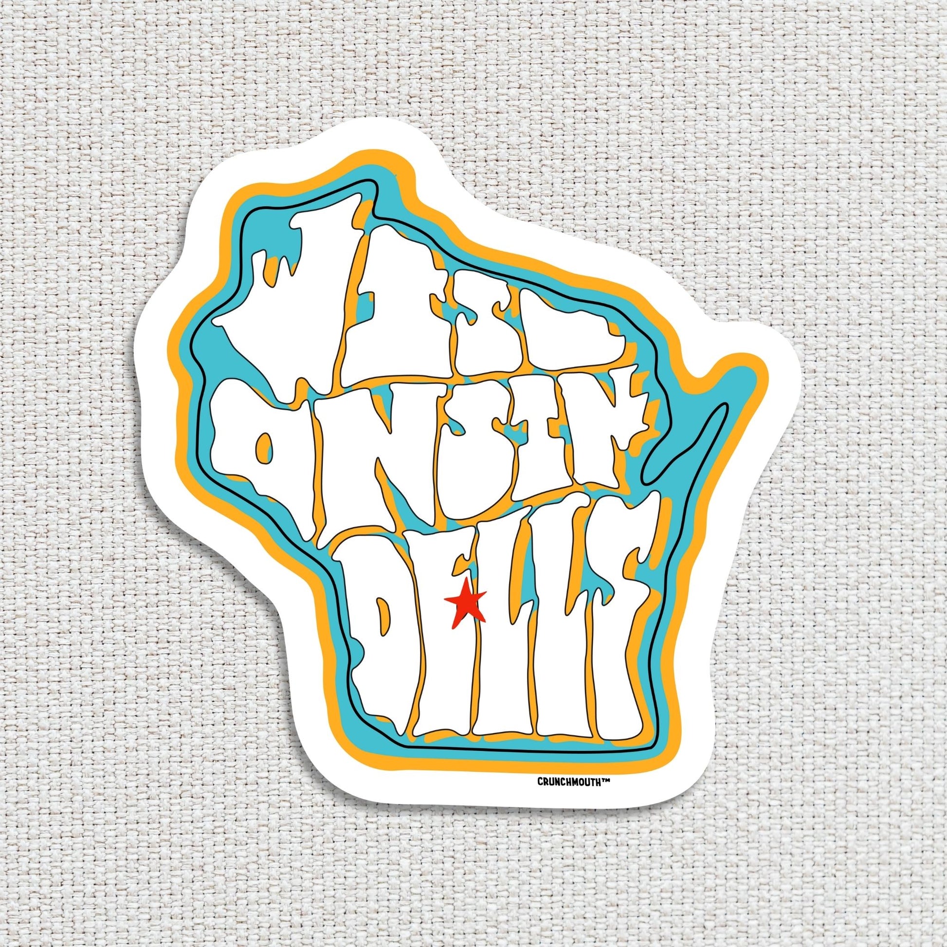 Wisconsin dells travel luggage sticker, hand display, textured fabric background
