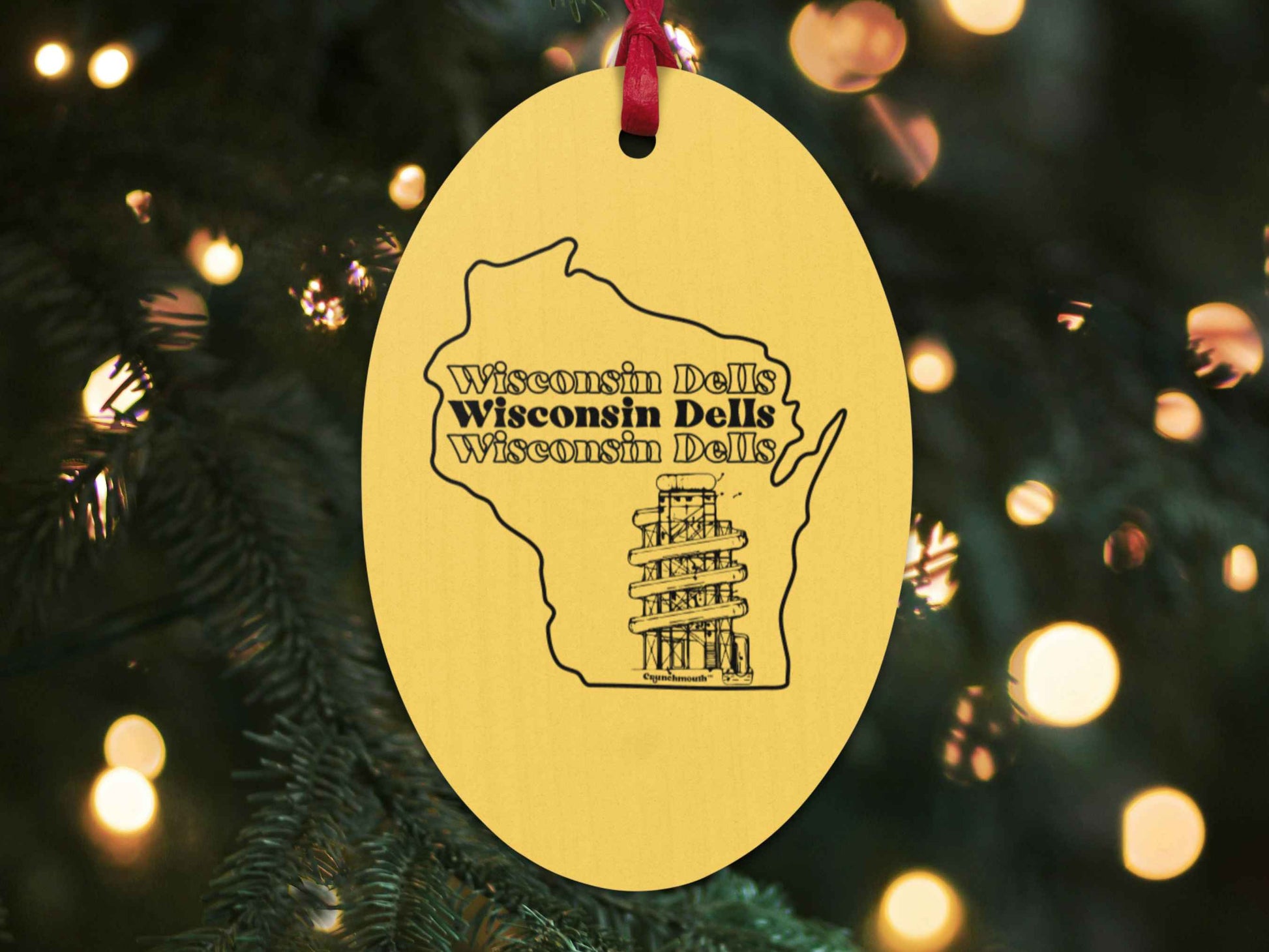 wisconsin dells Christmas ornament, front, Christmas tree background