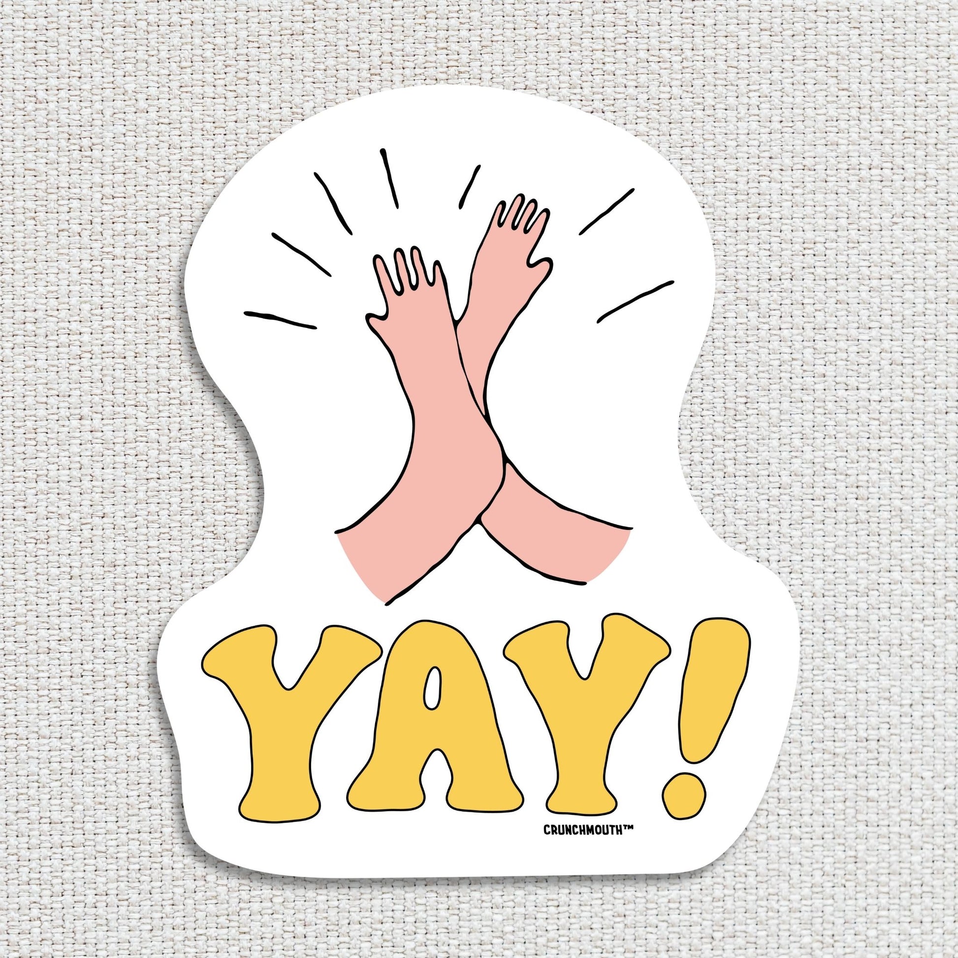 yay! high five sticker, textured fabric background

