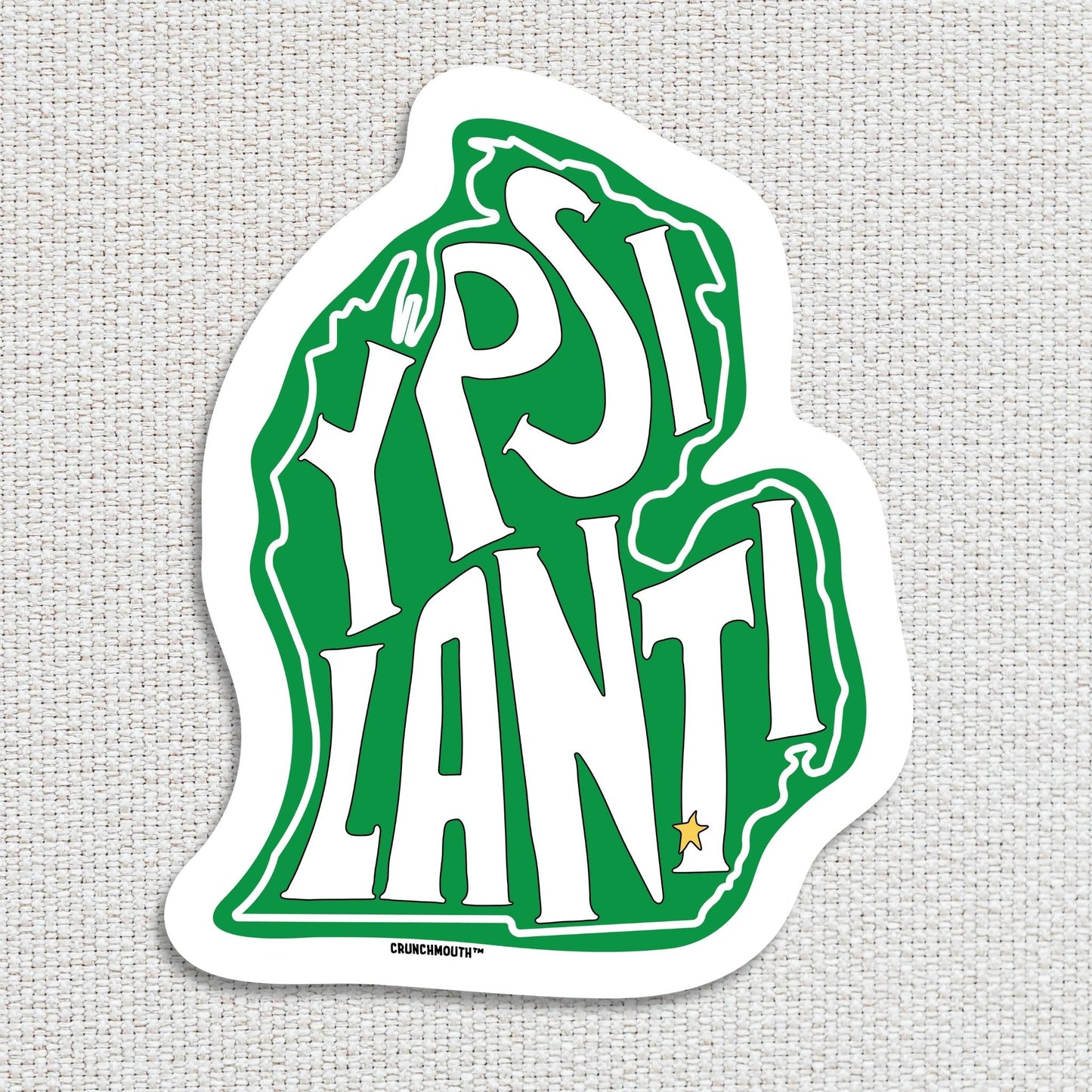 ypsilanti michigan travel luggage sticker, hand display, textured fabric background